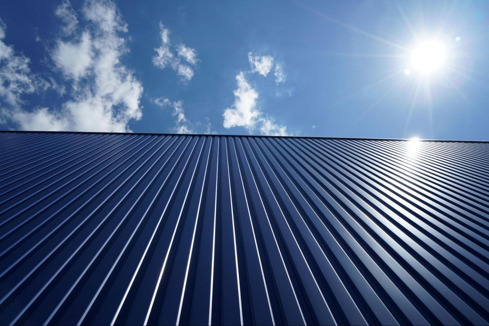 metal roof and cloudy sky