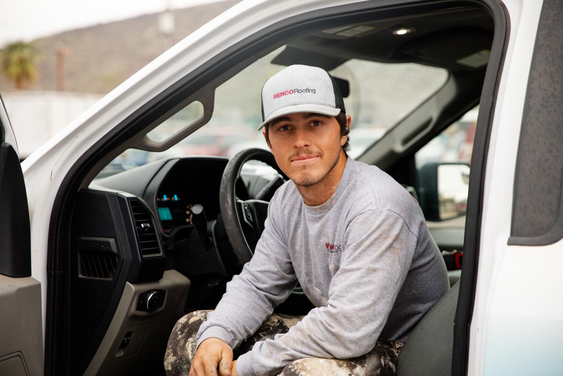 RENCO Roofing Employee in Truck