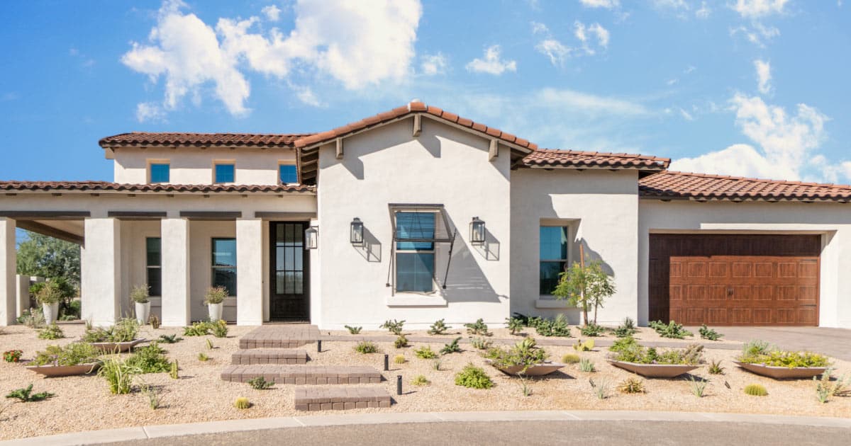 Fountain Hills adobe-style home with red clay roof tiles