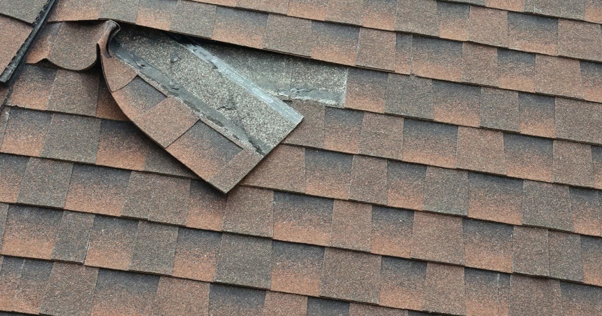 Asphalt tile roof section coming loose