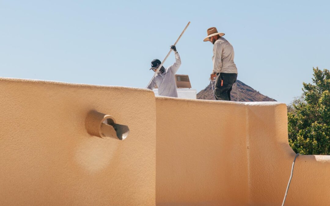 RENCO Roofing Team works on a roof coating project in Phoenix AZ