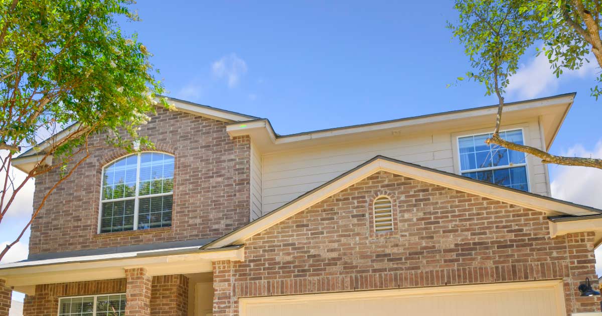 Two story home in Peoria with tile roofing